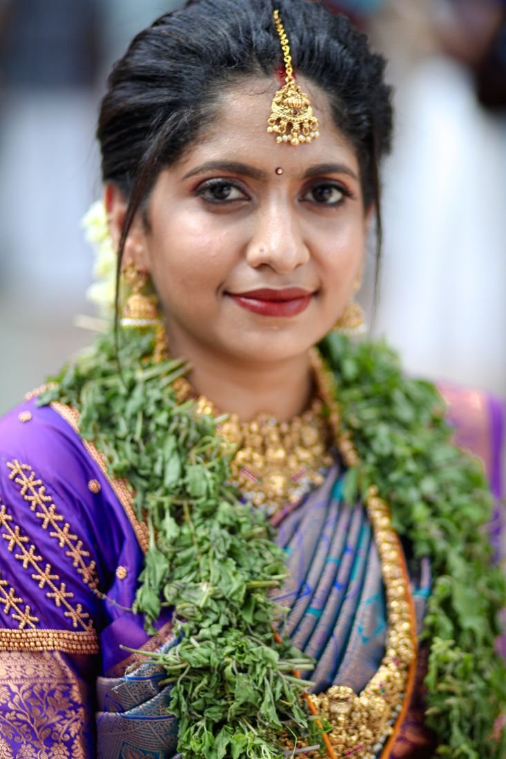Bridal makeup artist Guruvayur - bride with maang tikka and jhumka